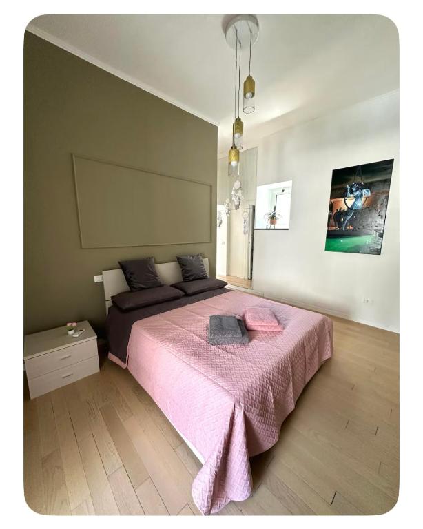 Postel nebo postele na pokoji v ubytování Borgo Vesuviano APT01