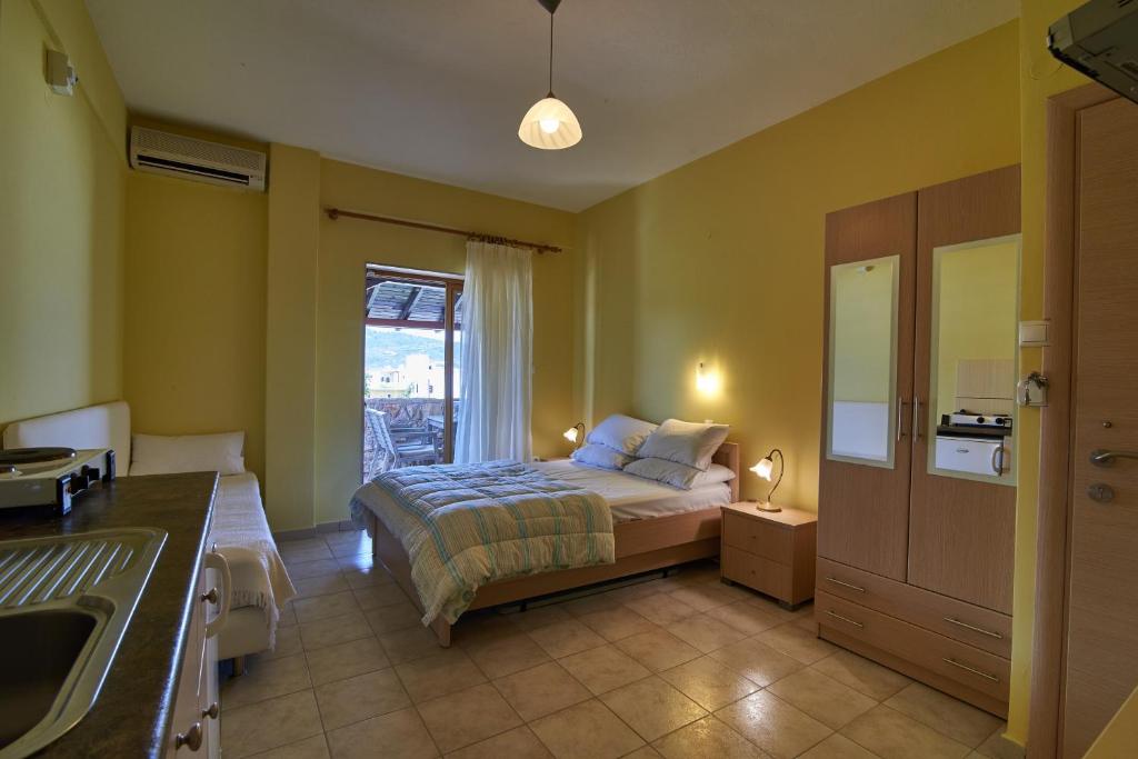 Posteľ alebo postele v izbe v ubytovaní Sarti Paradise
