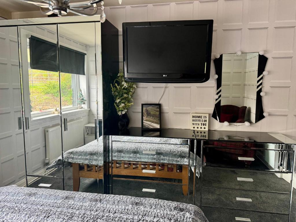 TV a/nebo společenská místnost v ubytování Seaview Cottage Bellochantuy