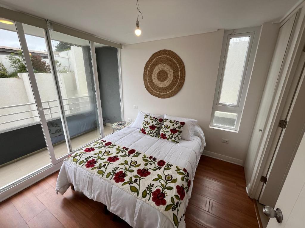 Ένα ή περισσότερα κρεβάτια σε δωμάτιο στο Moderno departamento Montemar Concón 1D 1B