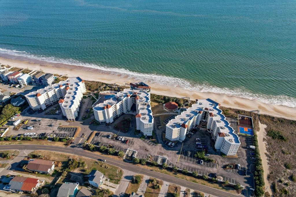 an aerial view of a resort near the beach at Poolside Paradise in North Topsail Beach