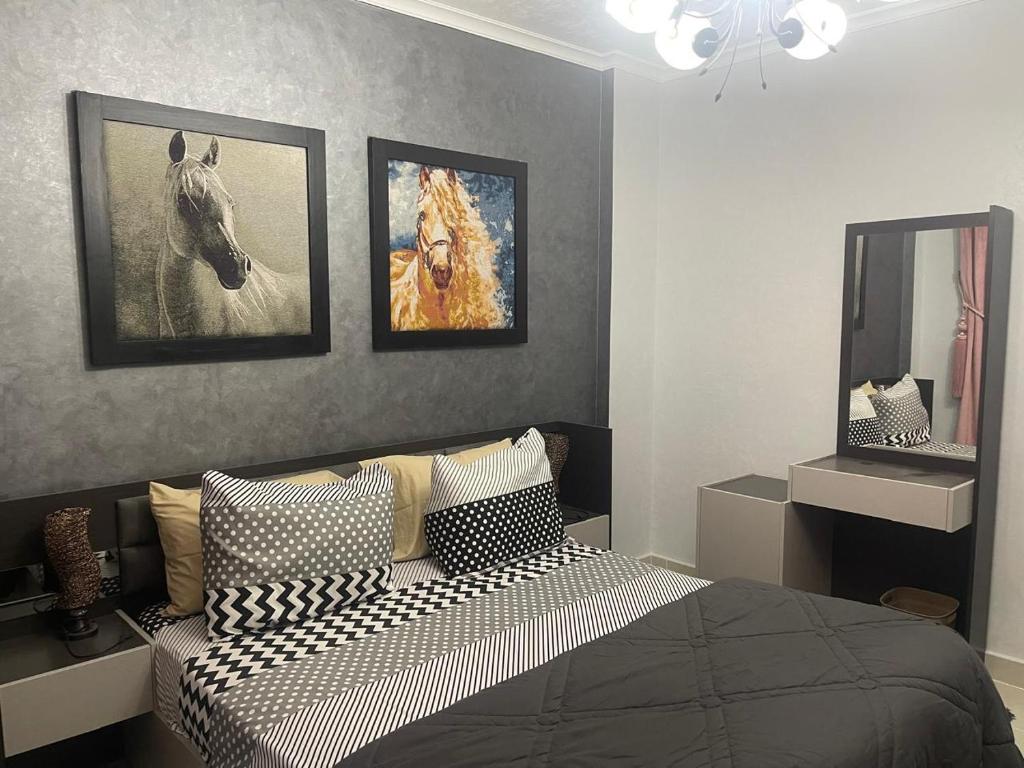 Ένα ή περισσότερα κρεβάτια σε δωμάτιο στο Cozy Comfort Flat , Madinaty