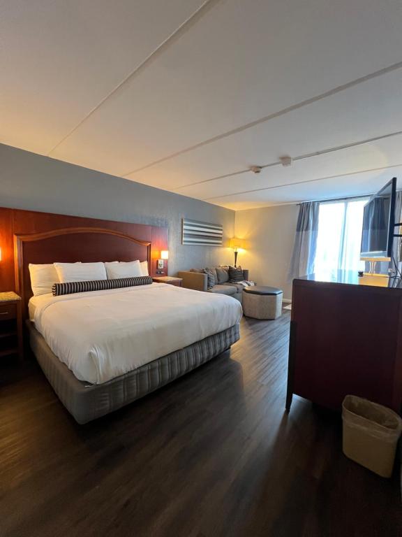 Ένα ή περισσότερα κρεβάτια σε δωμάτιο στο The Grand Hotel Spindletop