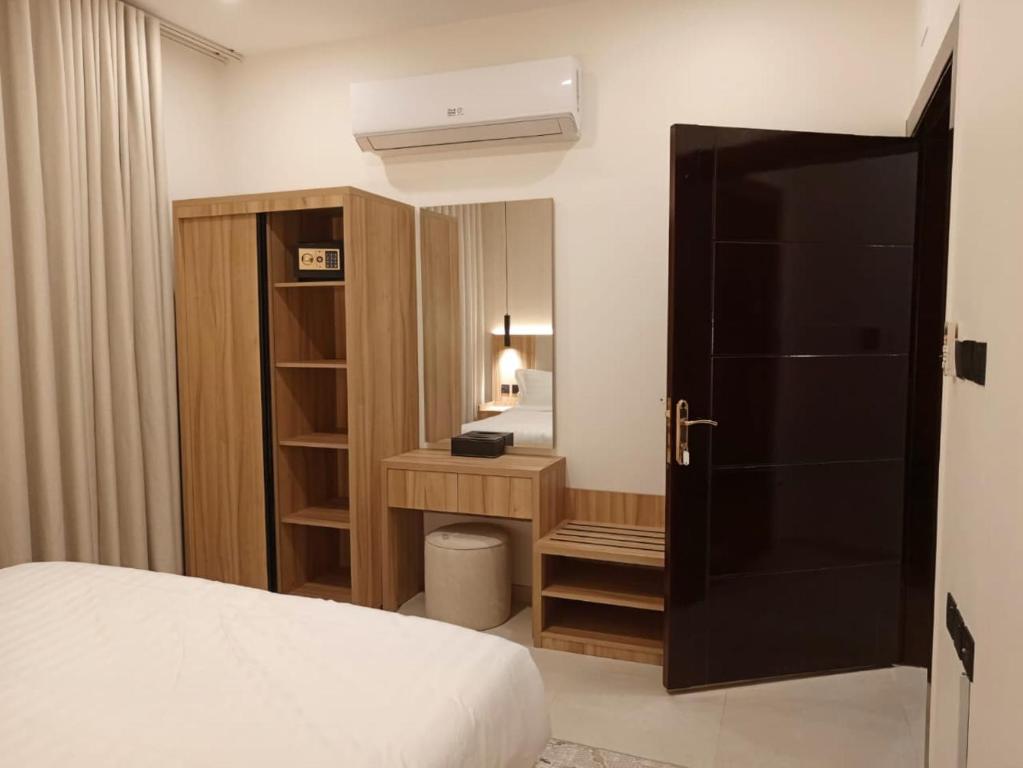 Giường trong phòng chung tại بيات للشقق المخدومة