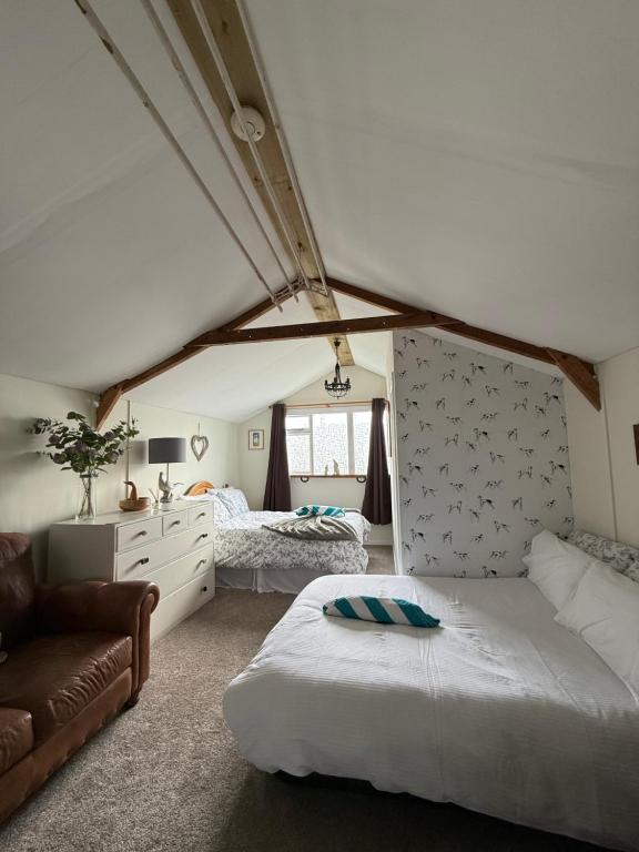 Postel nebo postele na pokoji v ubytování The Biscuit Box