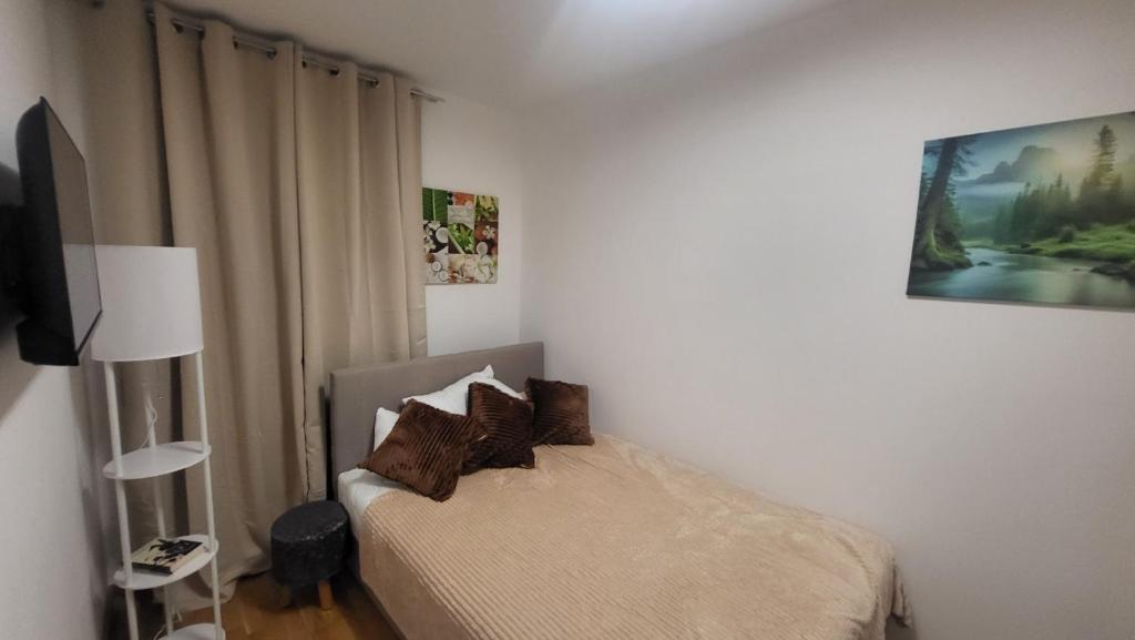 Postel nebo postele na pokoji v ubytování DivčiNova Lunasol