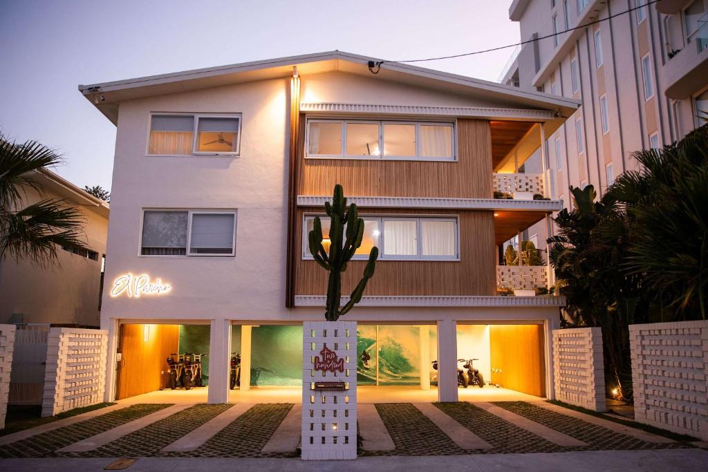a large white building with a cactus in front of it at El Parche Bilinga Beachside, Unit 5, Sleeps 6 in Gold Coast