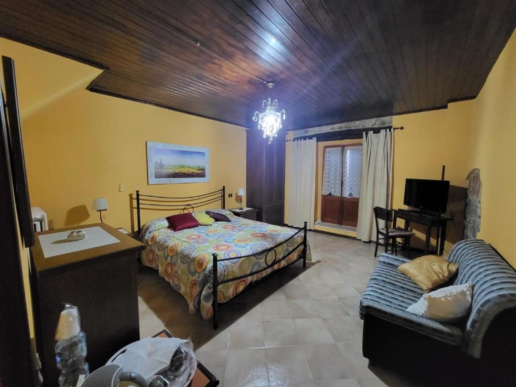 Ένα ή περισσότερα κρεβάτια σε δωμάτιο στο Borgo Maggiore