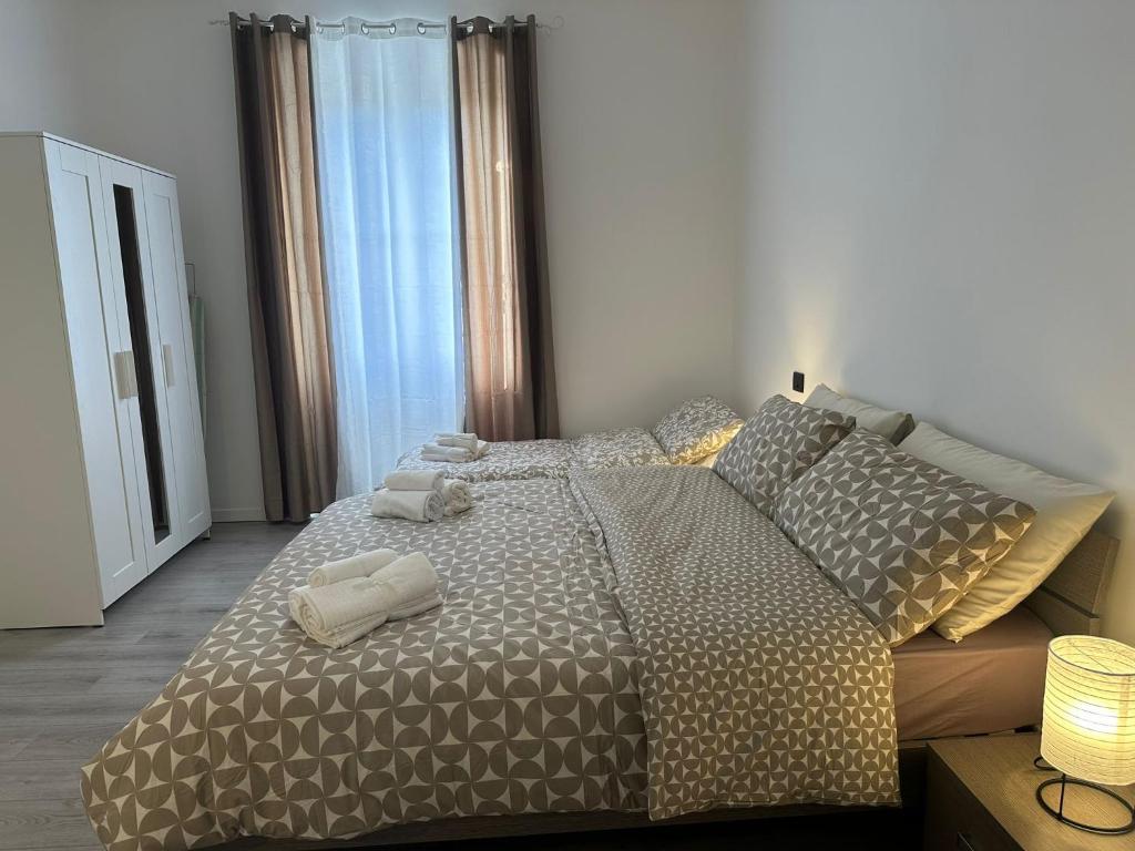 Ένα ή περισσότερα κρεβάτια σε δωμάτιο στο Holiday Home BRIN GENOVA