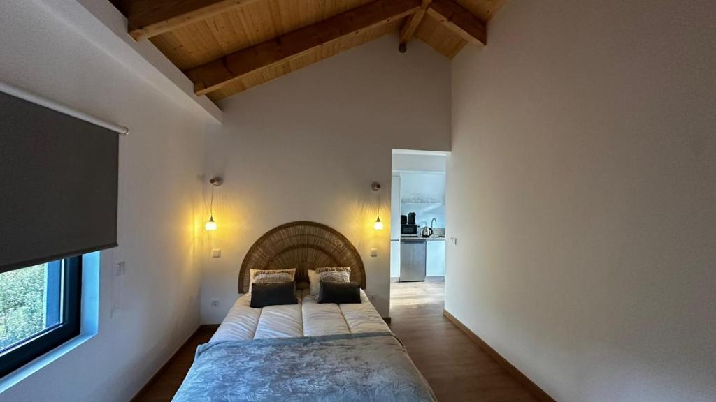 Postel nebo postele na pokoji v ubytování Quinta do Codeçal