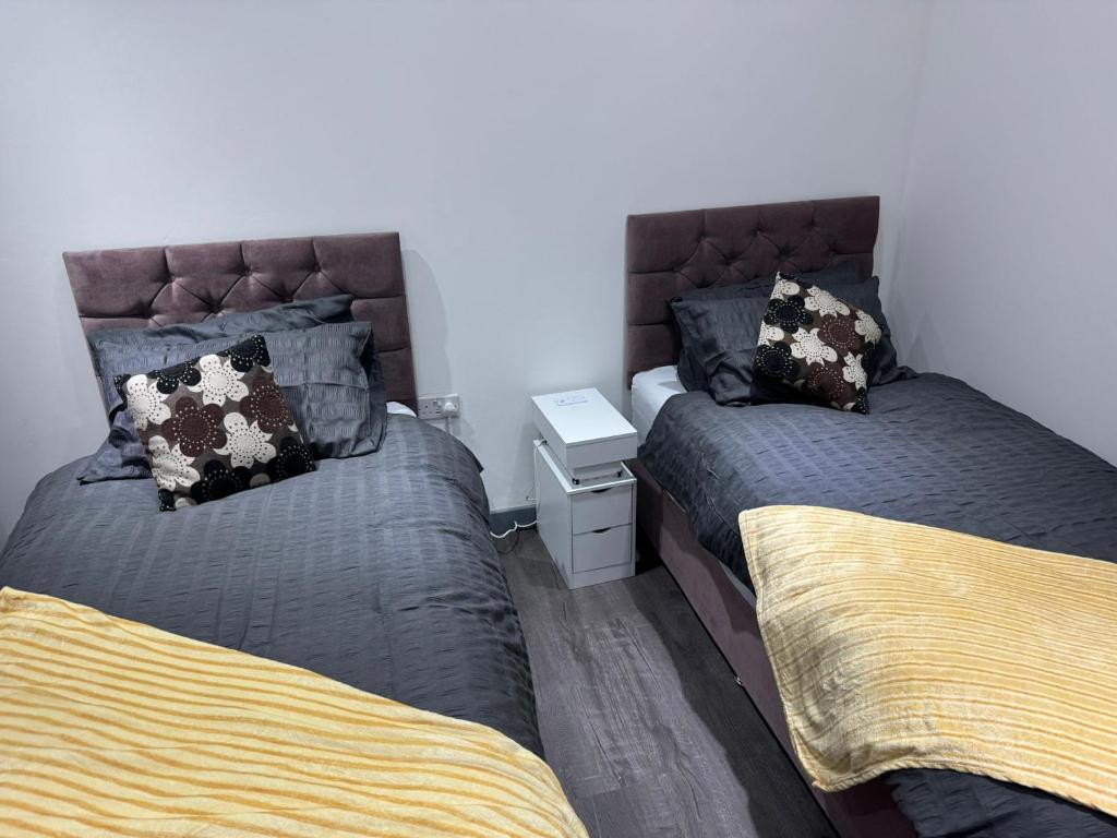 Ένα ή περισσότερα κρεβάτια σε δωμάτιο στο Chic Above Store