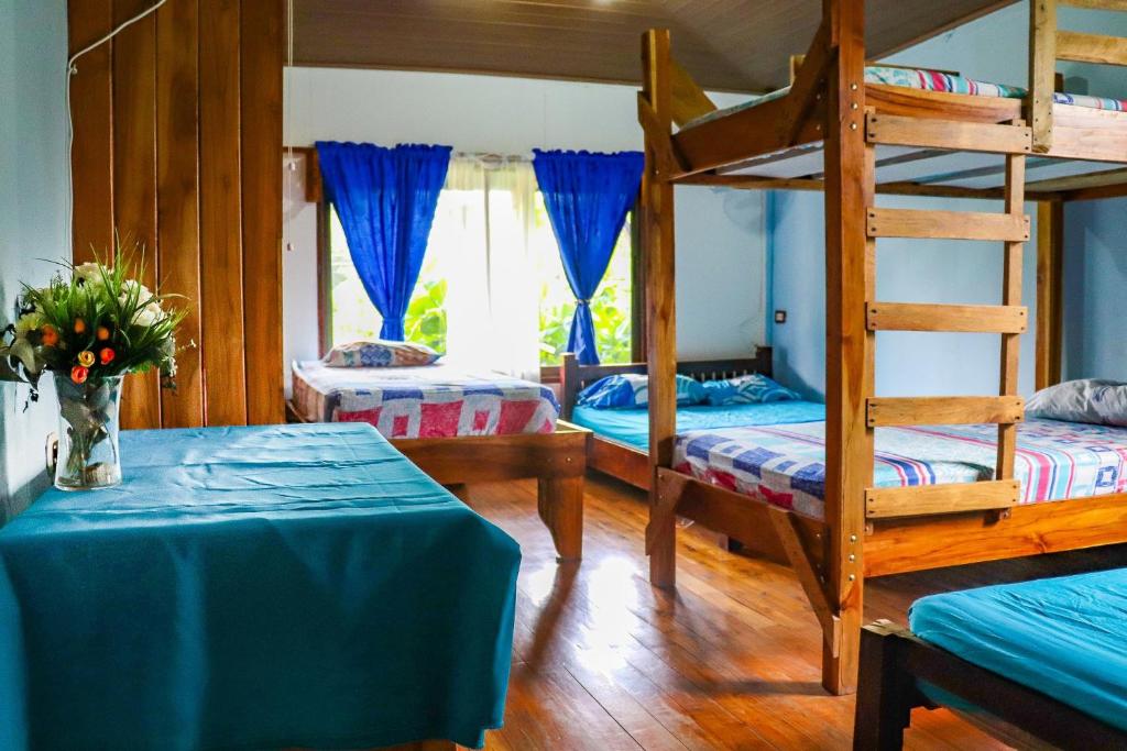 Ένα ή περισσότερα κρεβάτια σε δωμάτιο στο Lodge Mar y Sol