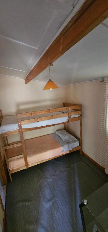 Postel nebo postele na pokoji v ubytování Cabaña Valle del Elqui, La Campana