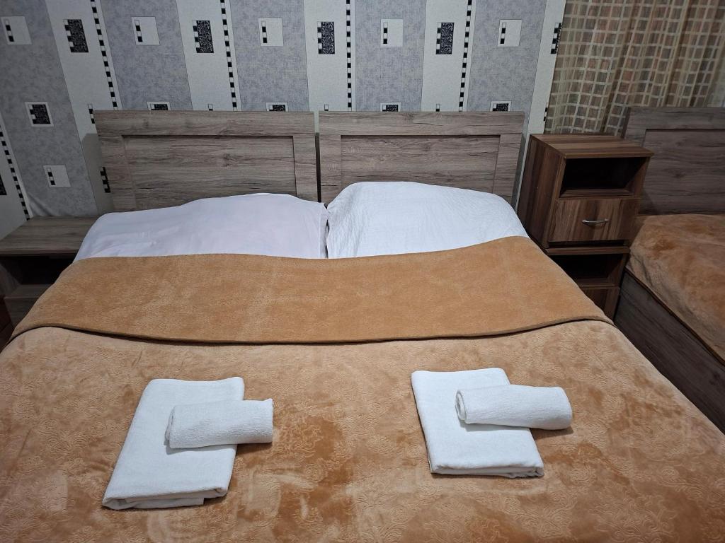 Postel nebo postele na pokoji v ubytování Family