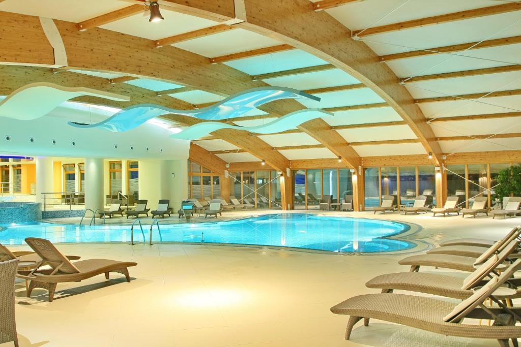 Bazén v ubytování Hotel Olimp nebo v jeho okolí