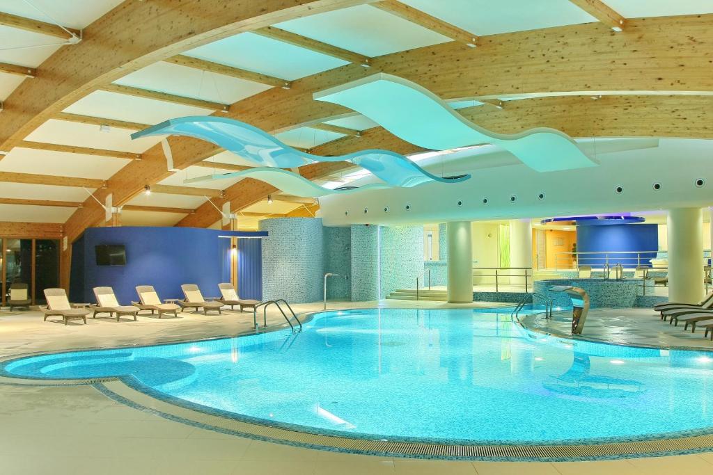 Bazén v ubytování Hotel Olimp nebo v jeho okolí