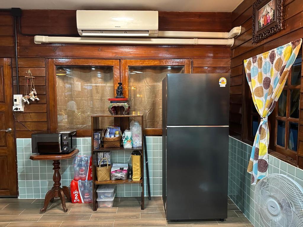 Kuchyň nebo kuchyňský kout v ubytování อิ๊กขะหลิ๊ก โฮมสเตย์ริมน้ำน่าน