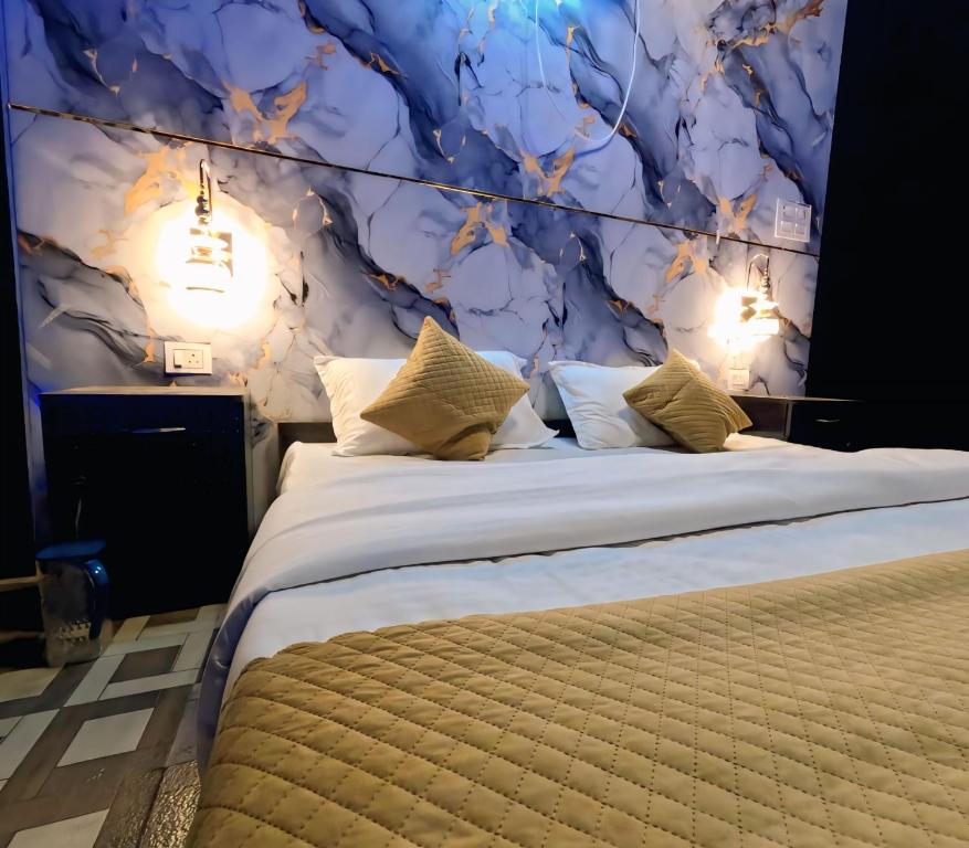 Postel nebo postele na pokoji v ubytování HR 26 Hotels & Resorts