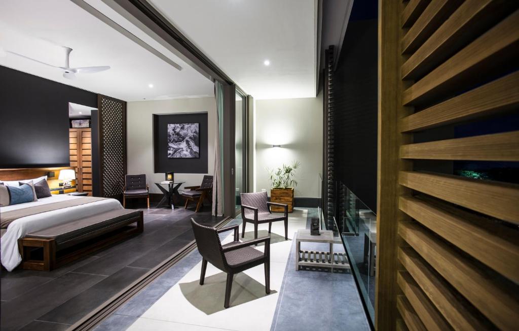 Cama o camas de una habitación en NIZUC Resort & Spa