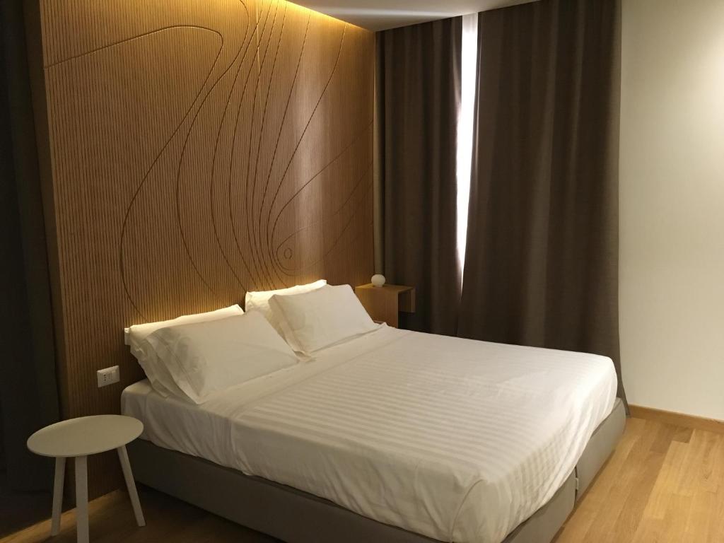 Łóżko lub łóżka w pokoju w obiekcie Gaura Apartments