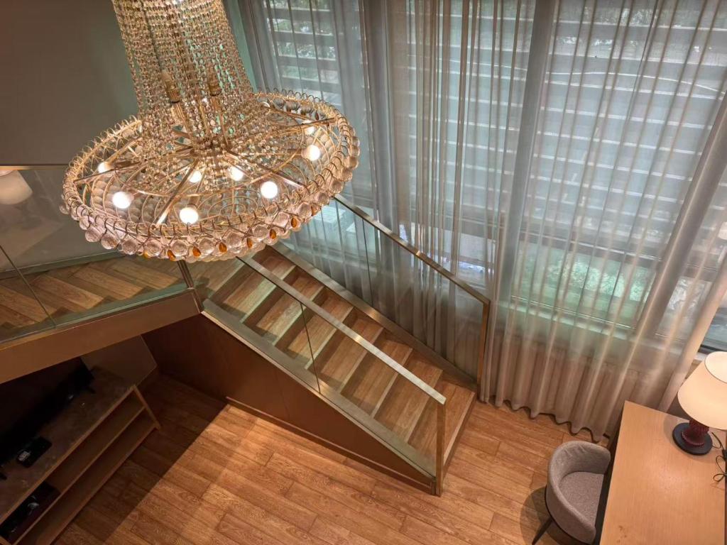 Χώρος καθιστικού στο World Hotel Jinan Harmony Plaza Qilu Children's Hospital Branch