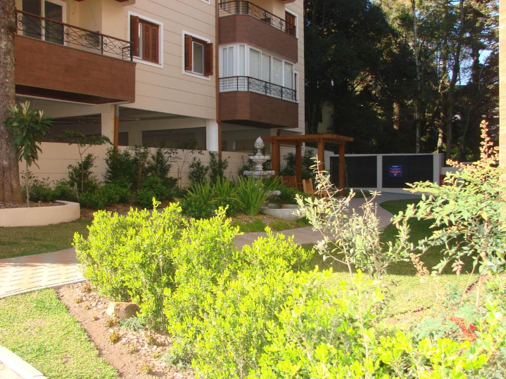 Un patio o zona al aire libre en Novo e no centro de Gramado