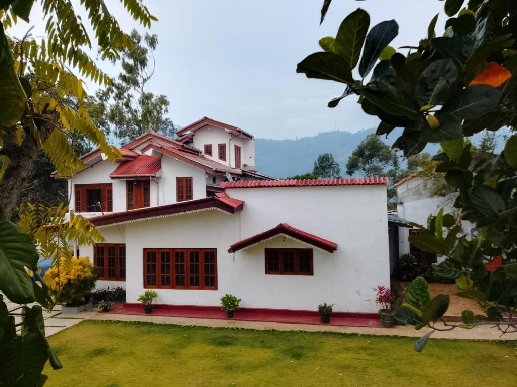 a view of the house from the garden at Penthouse Bandarawela in Bandarawela
