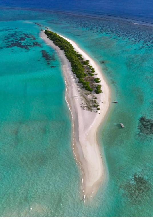 an aerial view of an island in the ocean at Zora Beach Inn Mathiveri in Mathiveri