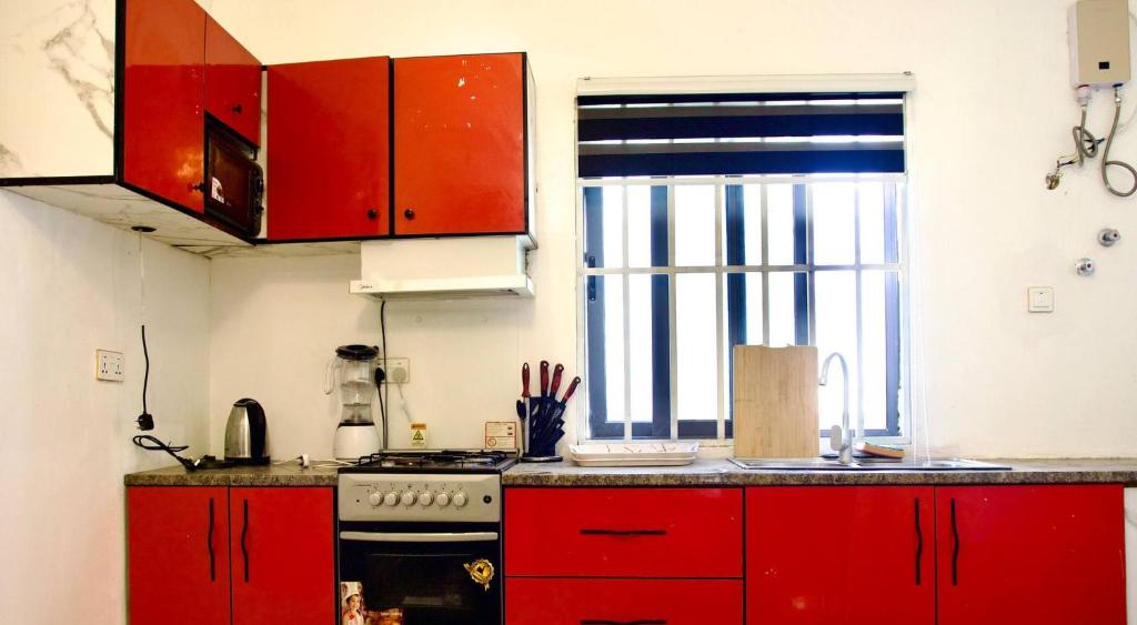 Kuchyň nebo kuchyňský kout v ubytování ftrealtyproperties Tango Suites 5