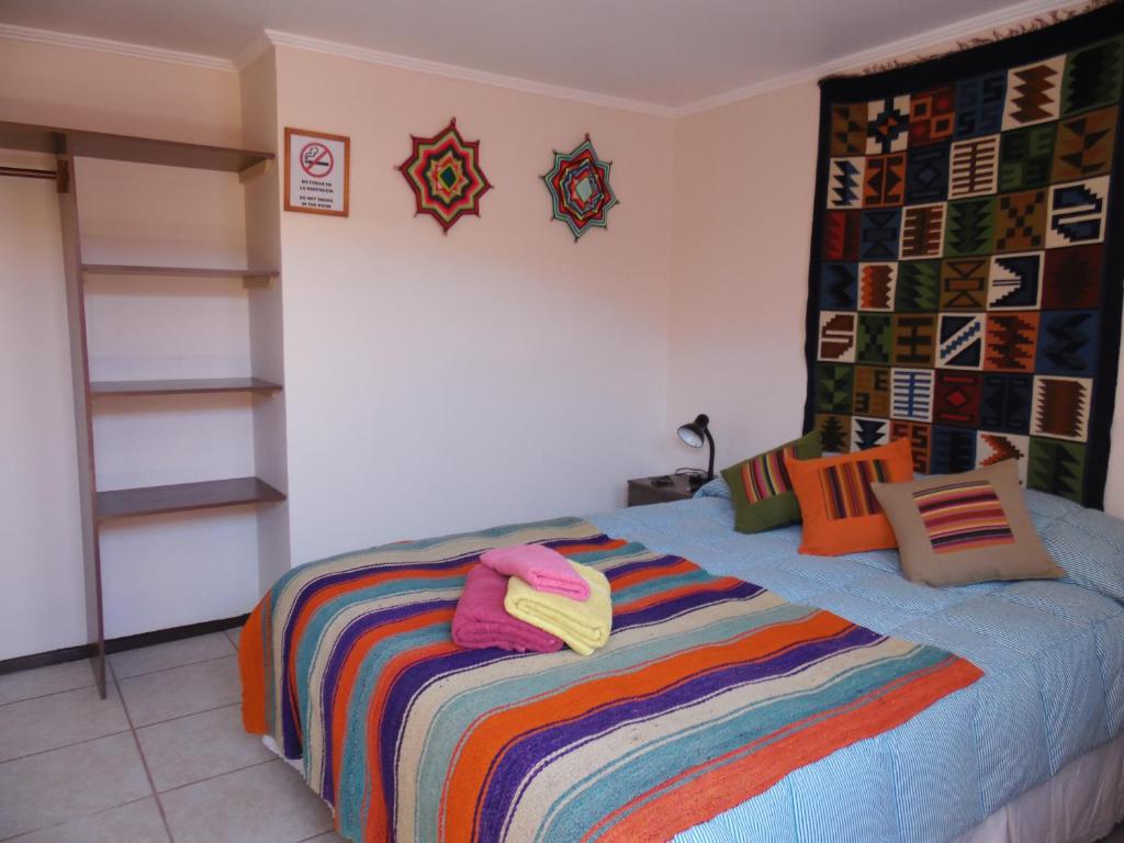 Letto o letti in una camera di Hostal Campo Base