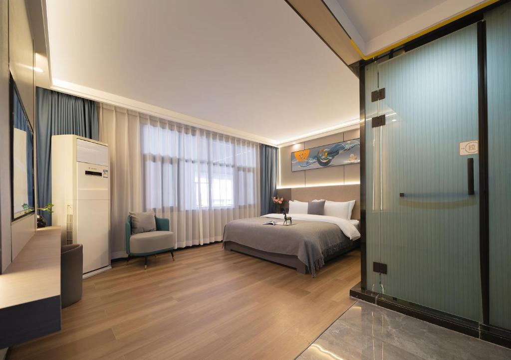 Ένα ή περισσότερα κρεβάτια σε δωμάτιο στο Yiyun Residence