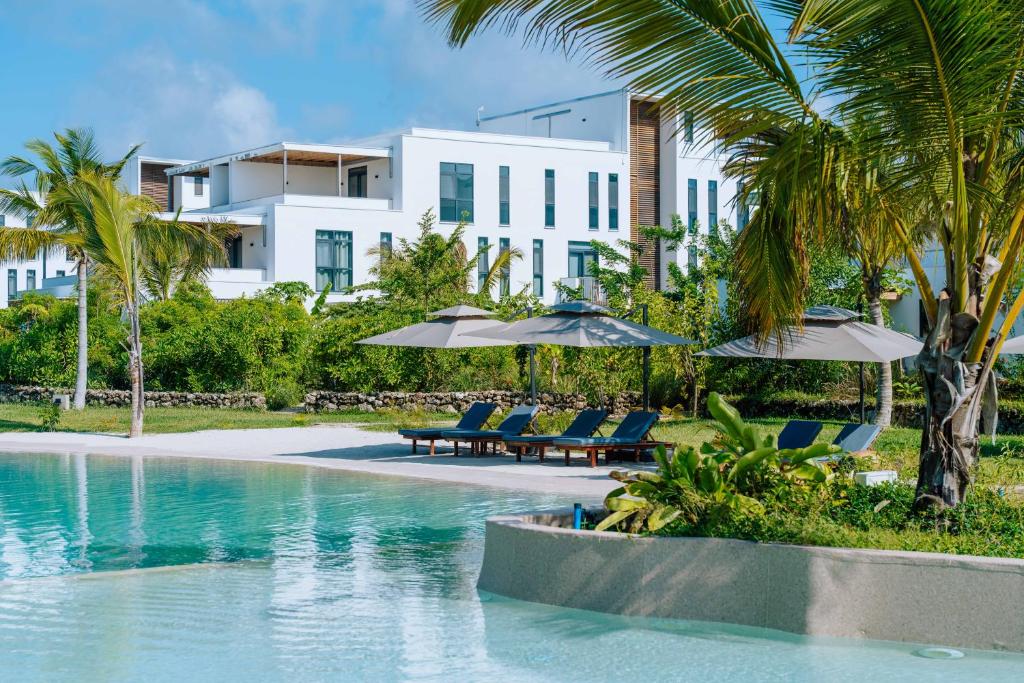 Bazén v ubytování Kejani Paradise - Tropical serviced Condo at The Soul, Paje nebo v jeho okolí