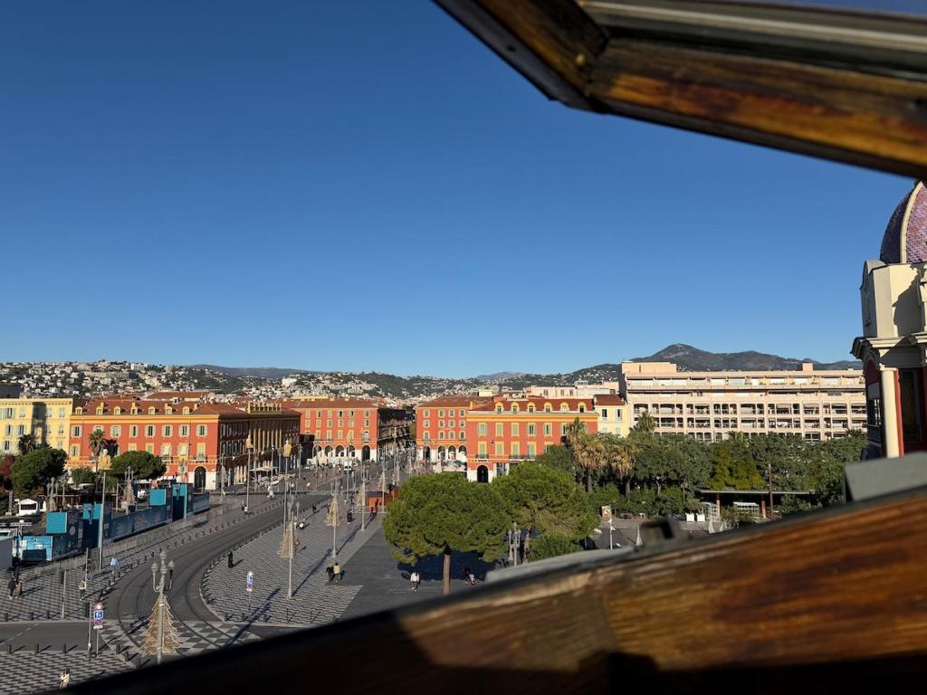 a view of a city street from a window at Studio Place Masséna Vieux Nice - situation idéale in Nice