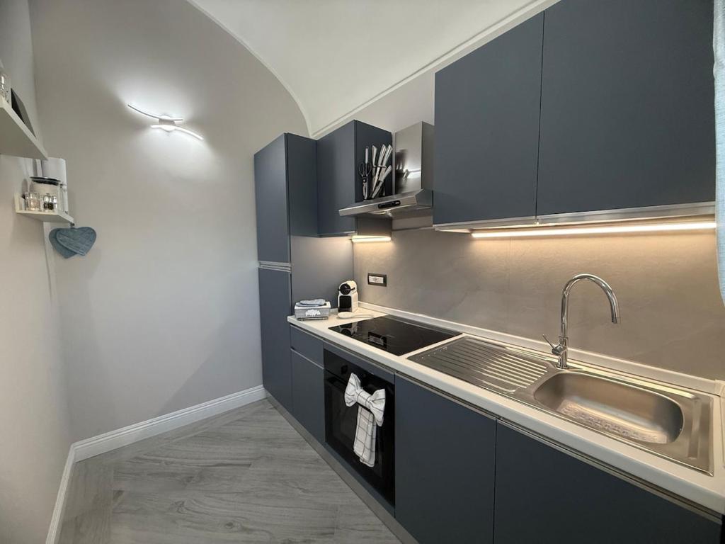 Η κουζίνα ή μικρή κουζίνα στο Appartamento in città immerso nel verde