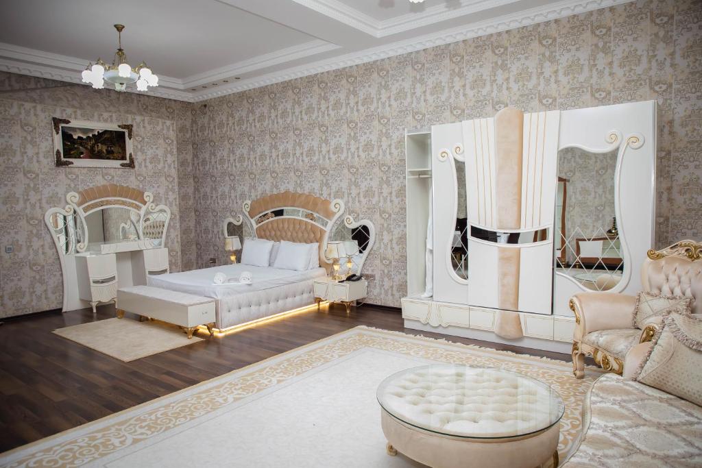 Postel nebo postele na pokoji v ubytování Milano Hotel