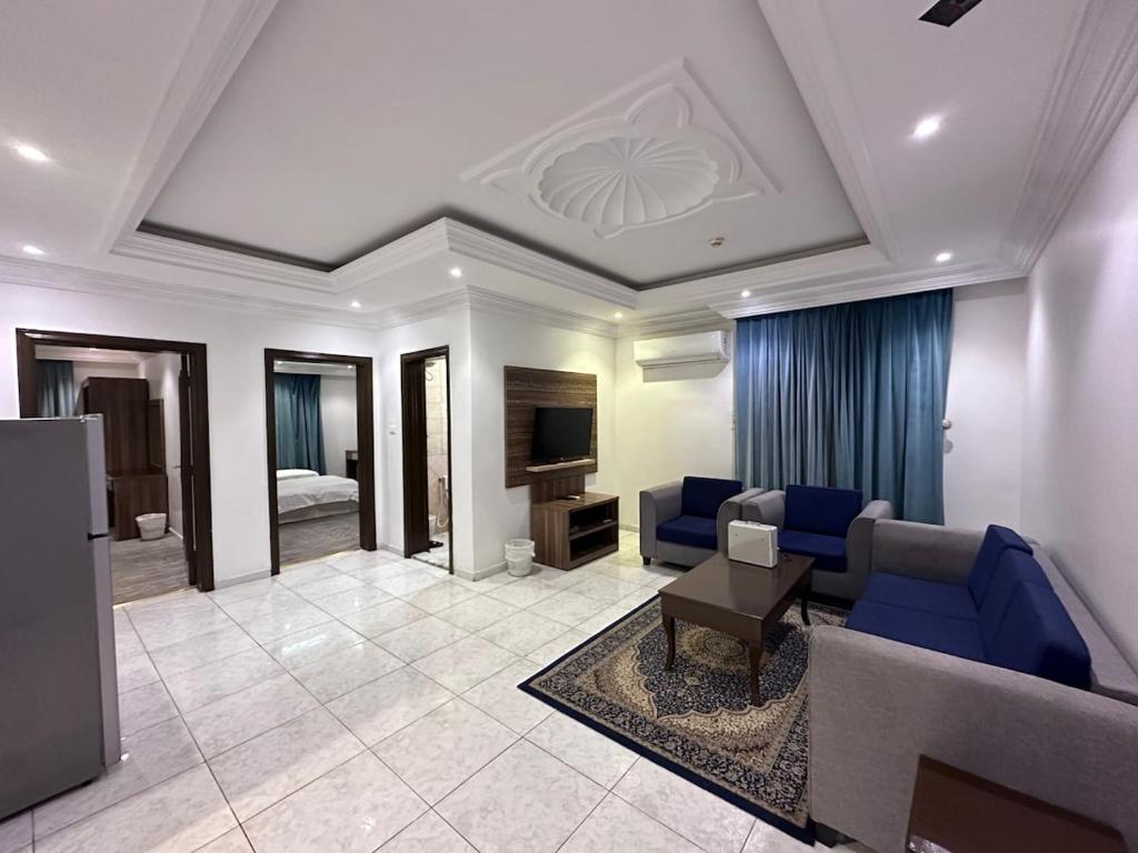 TV a/nebo společenská místnost v ubytování شقق الحمراء 1