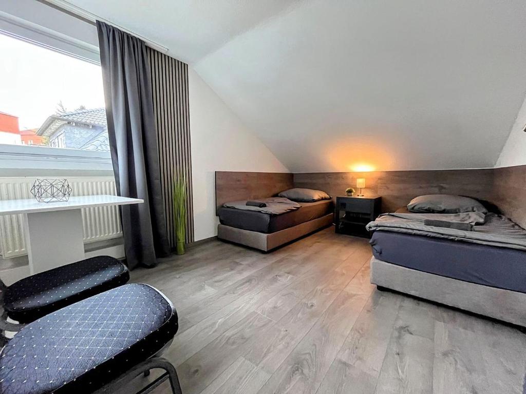 Χώρος καθιστικού στο Monteurhaus in Hemer - Gemeinschaftsnutzung Küche und Bad