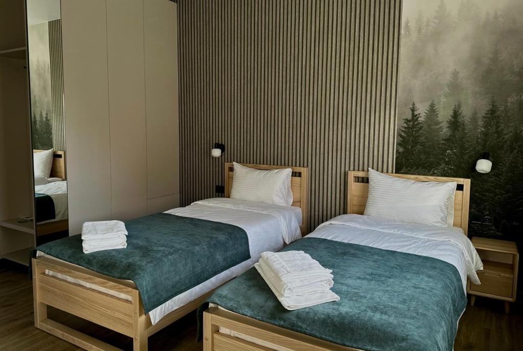 Ένα ή περισσότερα κρεβάτια σε δωμάτιο στο Апарт-готель "Модерн 24"