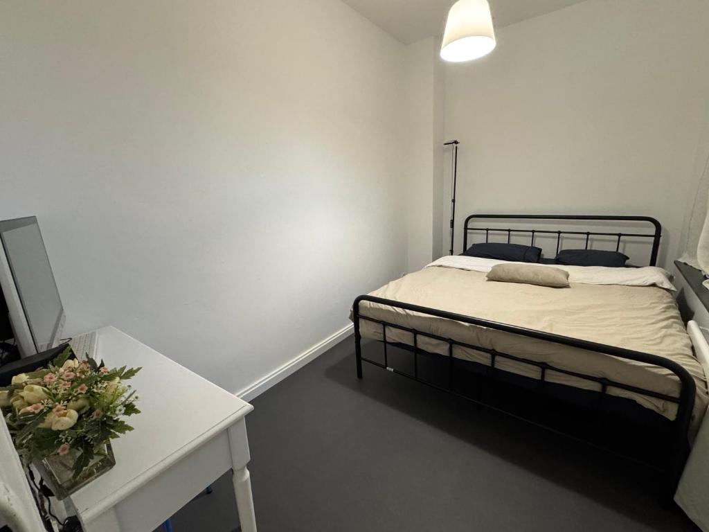 Postel nebo postele na pokoji v ubytování Chambre Roubaix