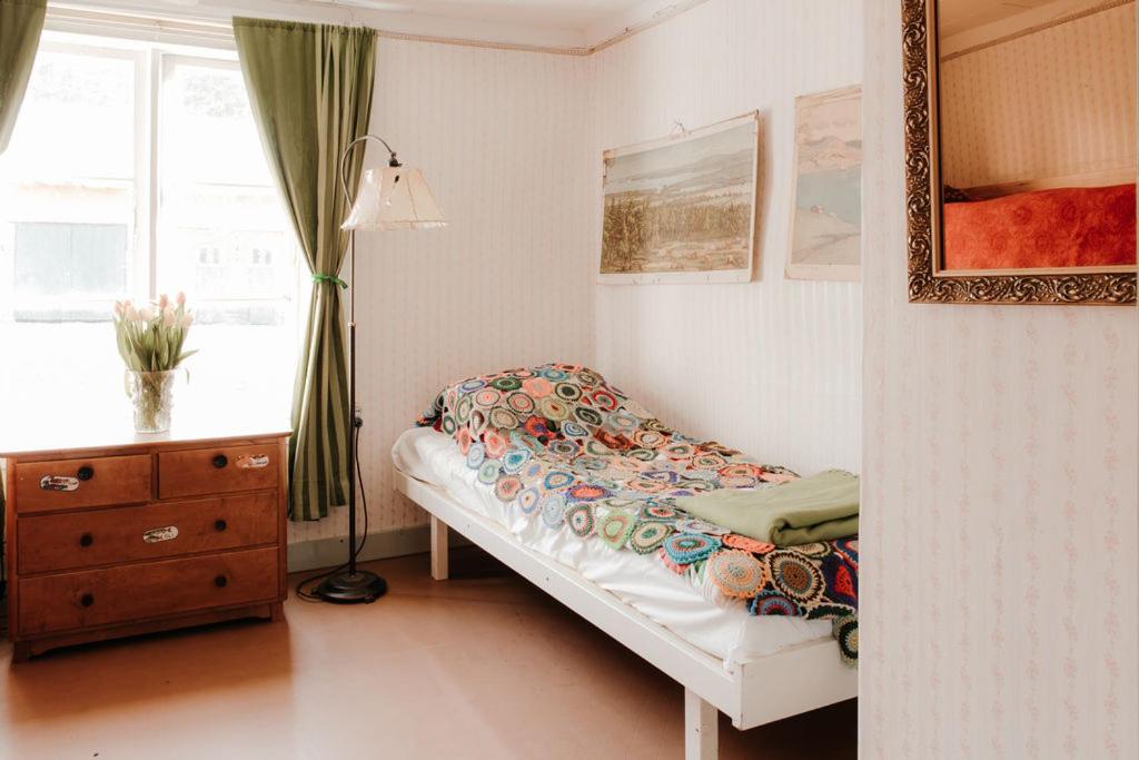 Postel nebo postele na pokoji v ubytování Kepuisten tila