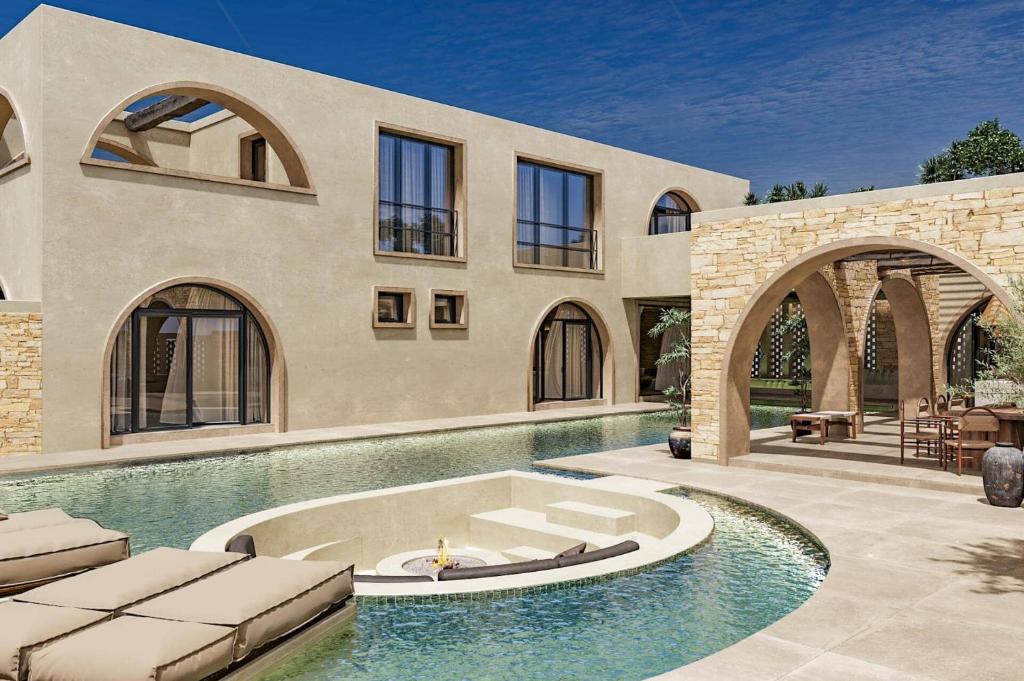 une maison avec une piscine et une terrasse dans l'établissement Villa Lavender by Villa Plus, à Kolimbia