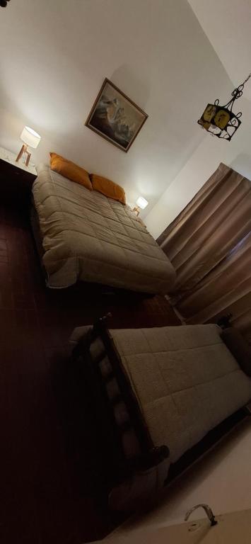 Ένα ή περισσότερα κρεβάτια σε δωμάτιο στο La Teresa