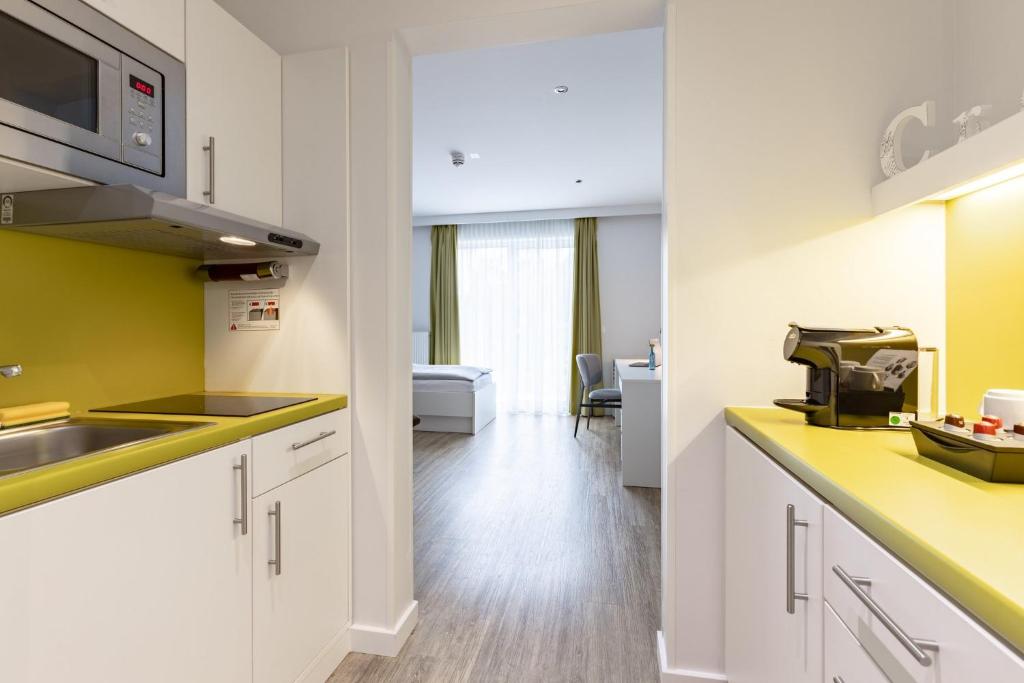 Η κουζίνα ή μικρή κουζίνα στο Candlewood Suites Fürth by IHG