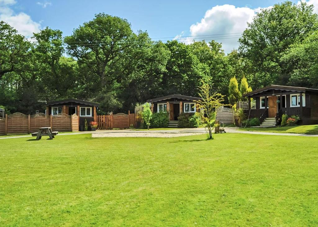 Κήπος έξω από το Heronstone Lodges