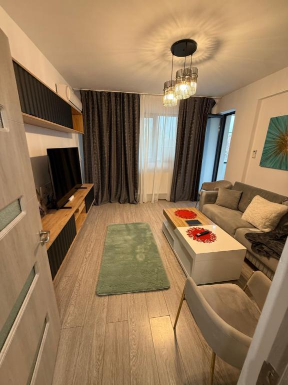 TV a/nebo společenská místnost v ubytování Vibe apartaments