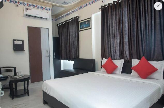 Voodi või voodid majutusasutuse HOTEL ARAWALI UDAIPUR CITY BEST couples friendly stay toas