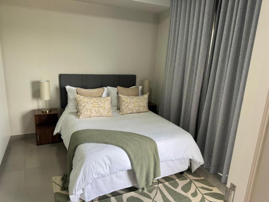 Ένα ή περισσότερα κρεβάτια σε δωμάτιο στο Durbanville Daydream