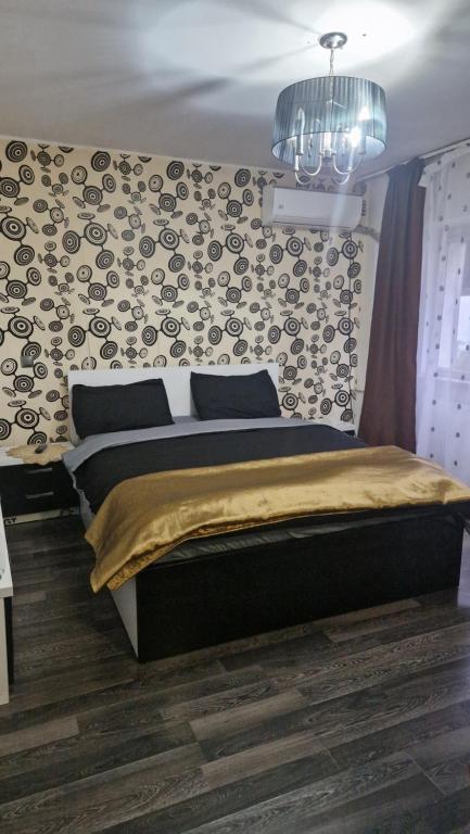 Ένα ή περισσότερα κρεβάτια σε δωμάτιο στο Apartament Vintage