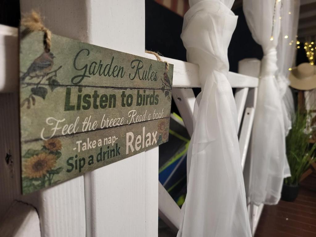 a sign on a white chair with a wedding dress at #437 Status Relax Like a Boss in Biograd na Moru