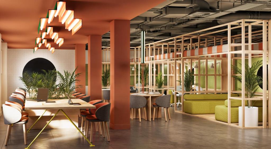 a rendering of a restaurant with tables and chairs at Residencia Universitaria Resa Campo Grande in Valladolid